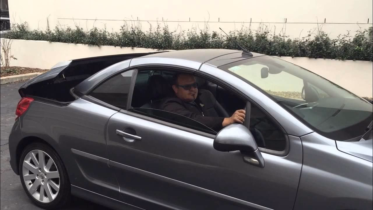 How to wind a Peugeot 207CC roof motor?