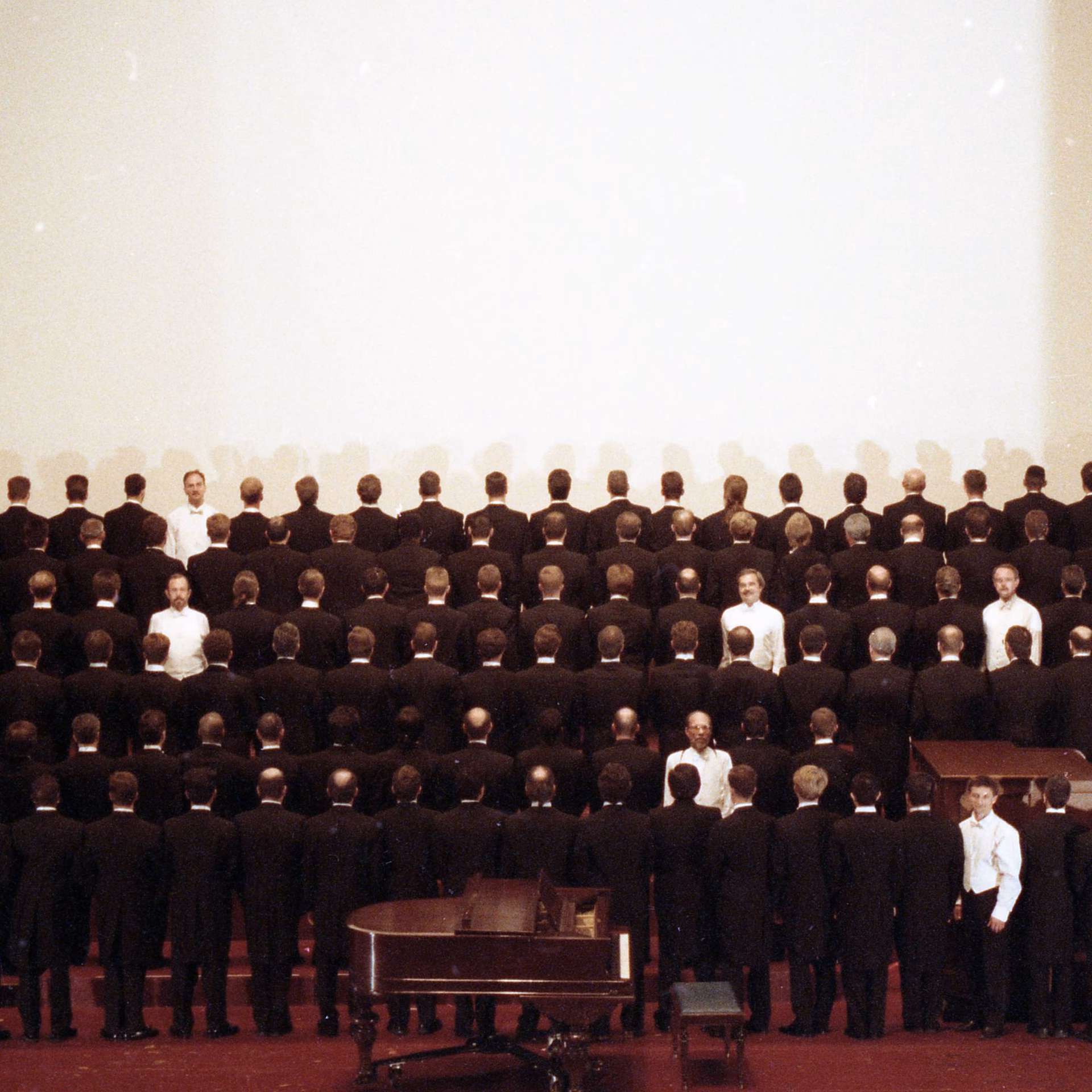 What anthems are sung by the gay men's chorus?