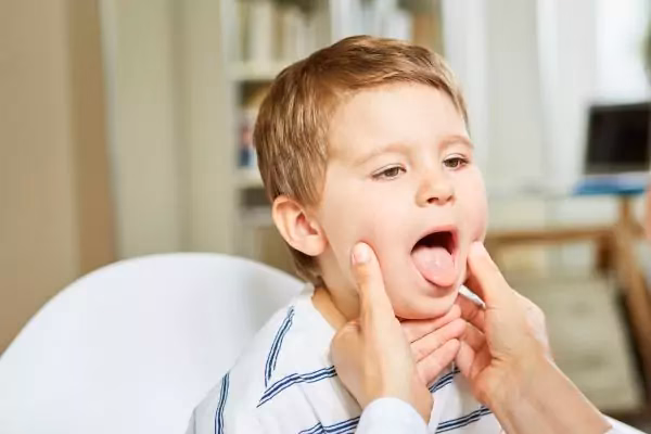 What are the symptoms of anemia in children?