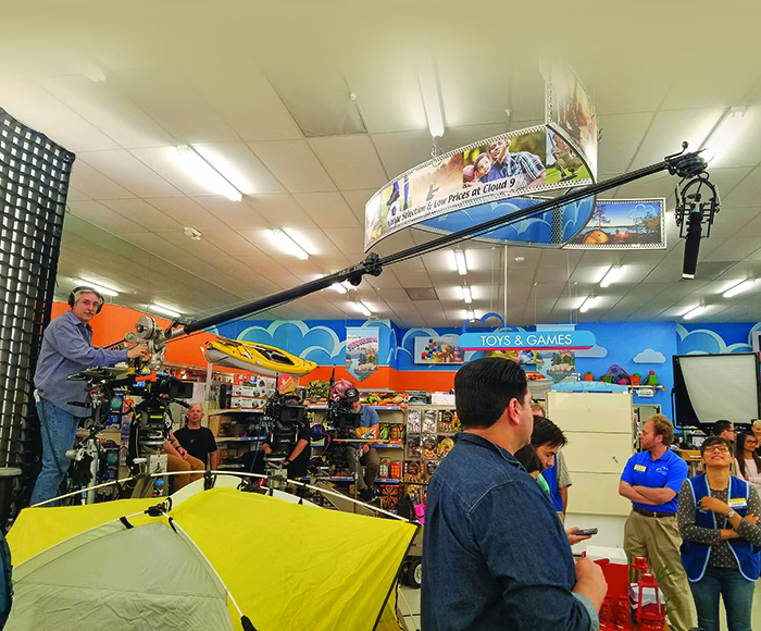 Can wind knock over a boom lift?