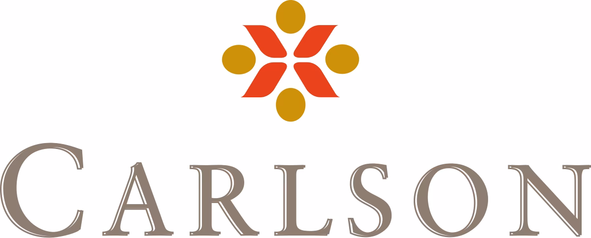 Does Carlson own a hotel?