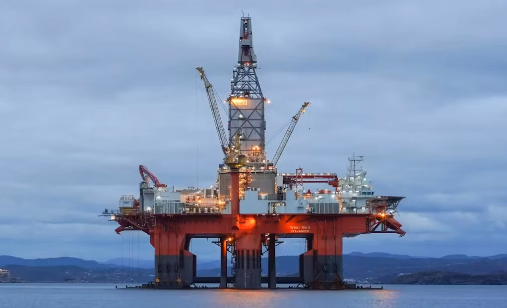 What is a drilling rig day rate?