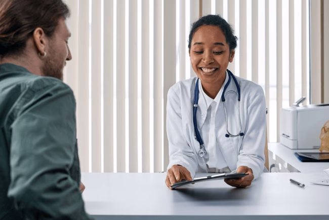 How do I get a new GP in Denmark?