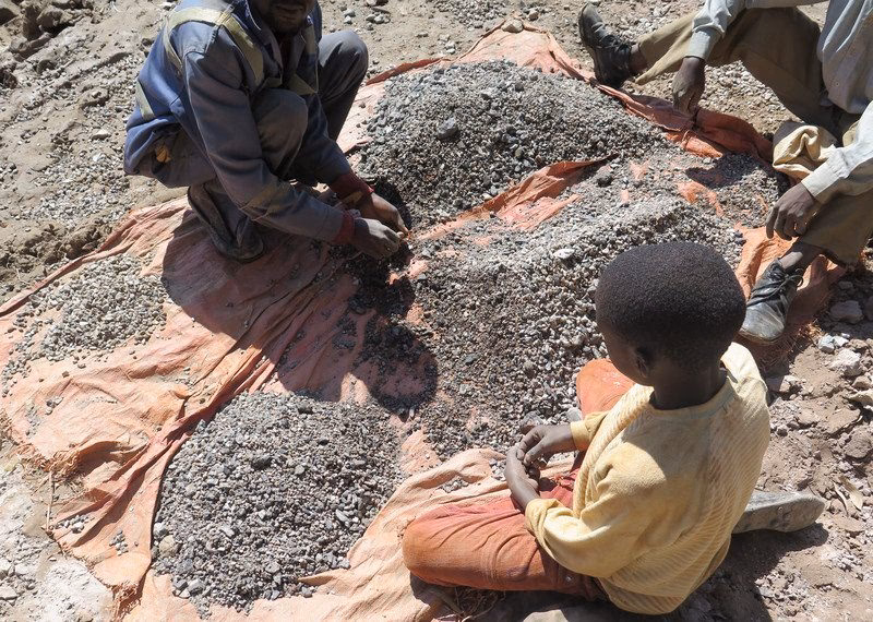 How many hours a day do children work in mines?