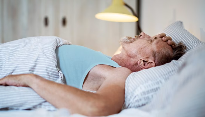 How does a fever affect sleep?