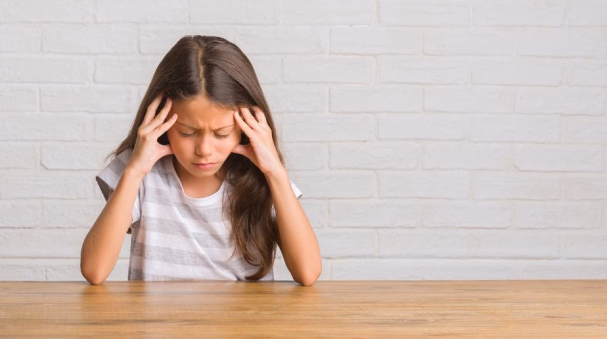 What age should a child with migraine headaches go to a doctor?