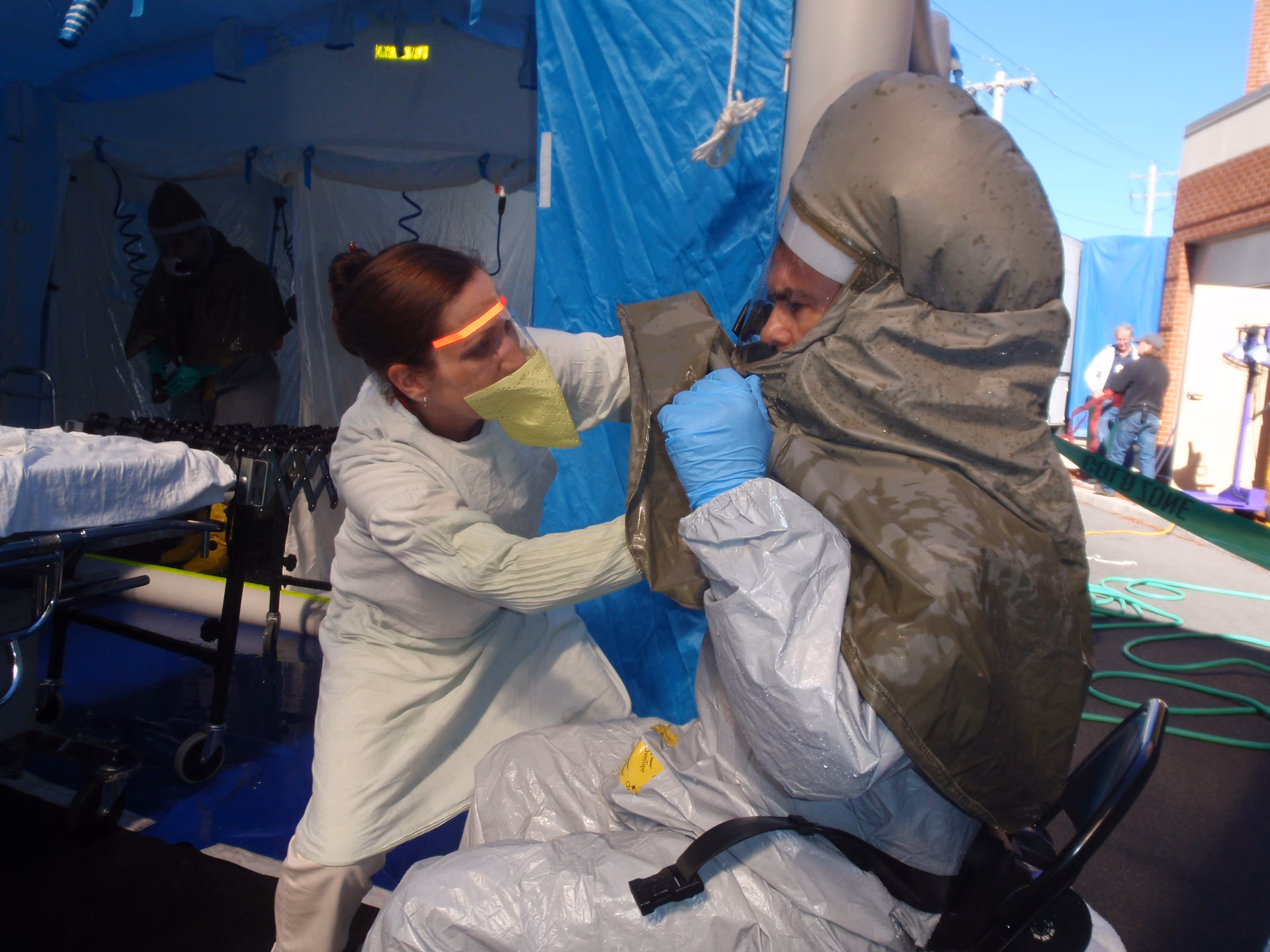 What happens if a patient goes to a decontamination unit?