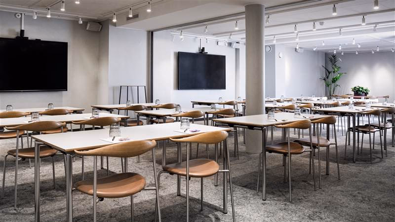 Why should you attend a conference in Denmark?