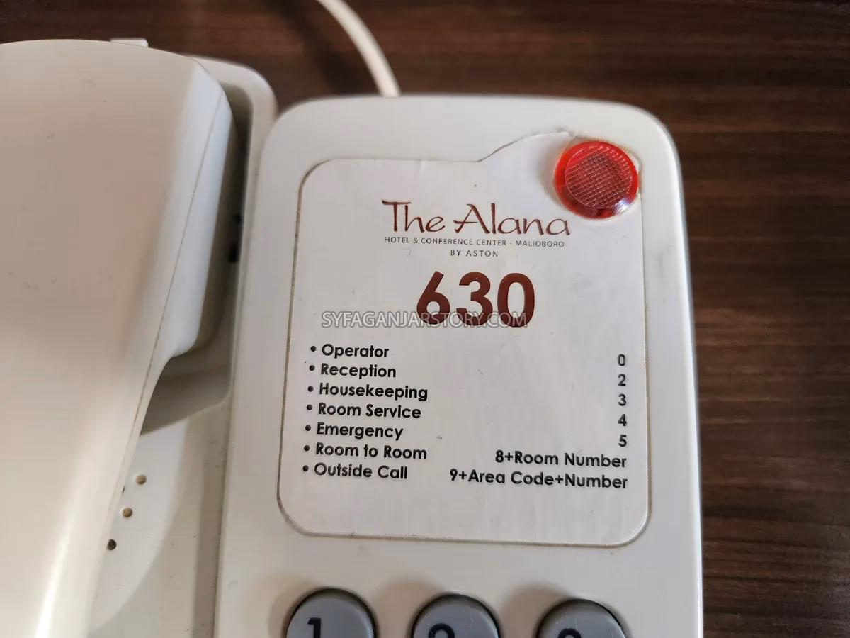 How do I use a hotel phone?