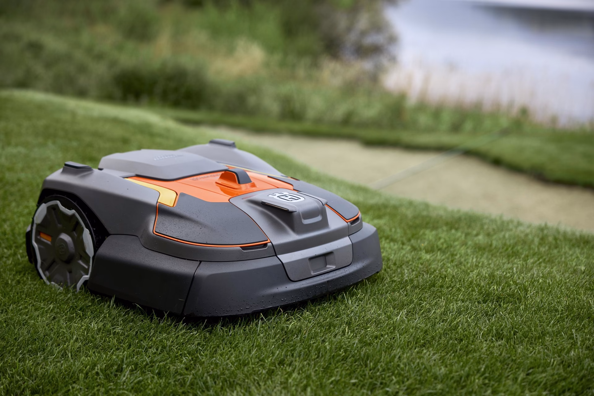 How does a robotic lawn mower work?