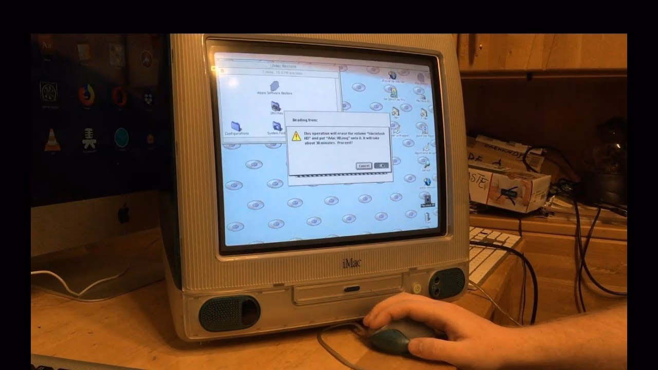 What operating system does the iMac run?