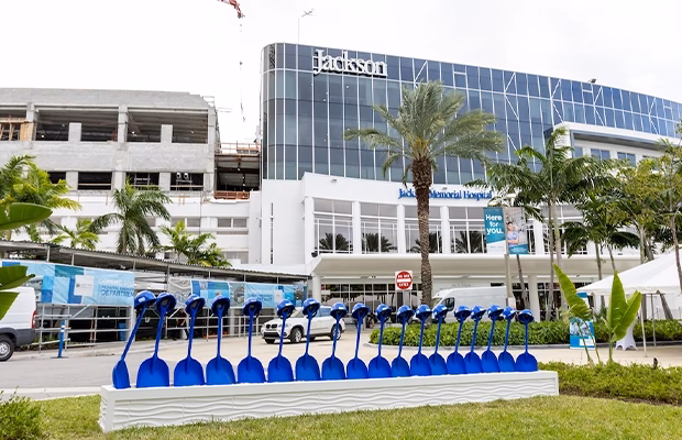 Who owns Jackson Memorial Hospital in Miami-Dade County?