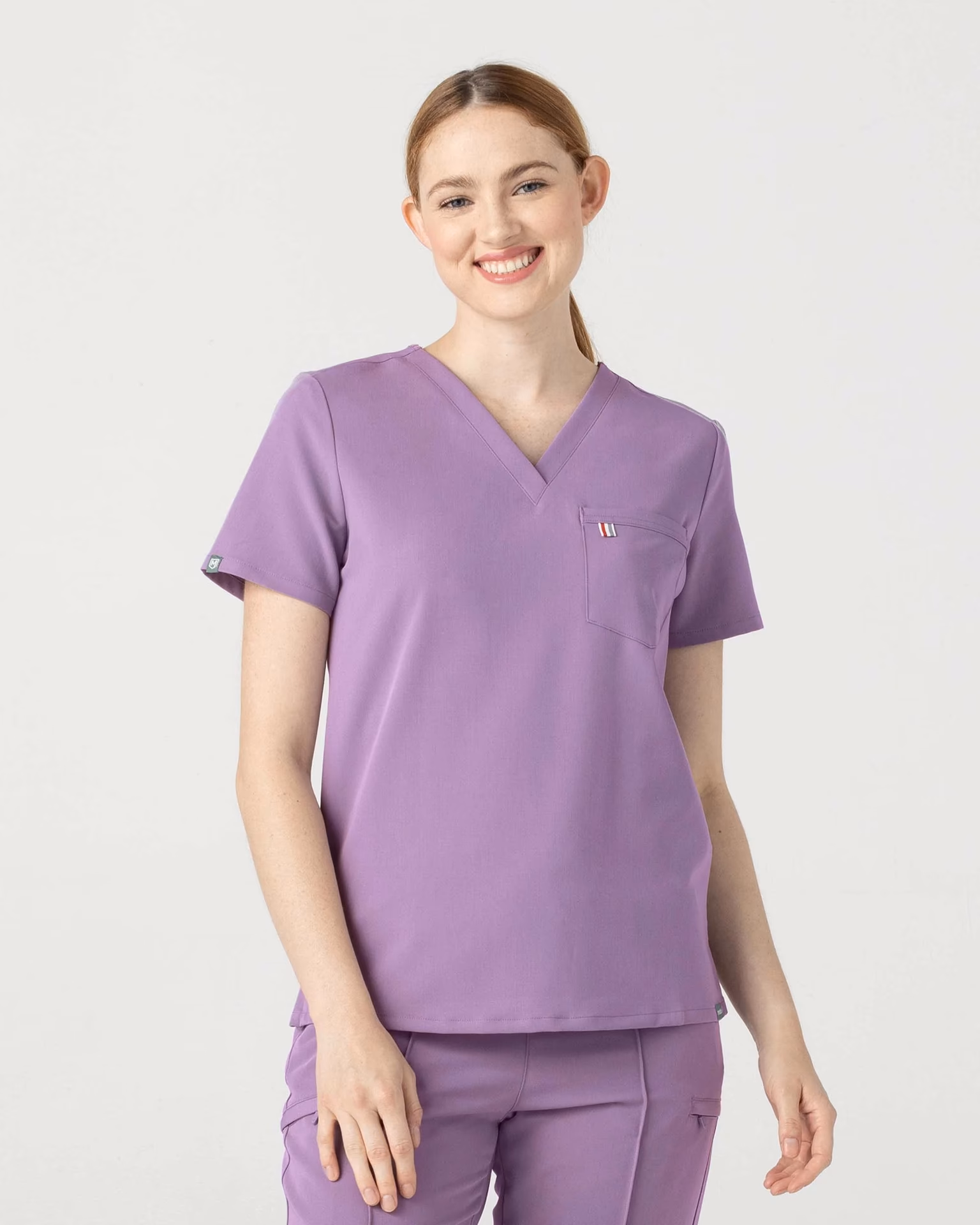 Why do hospitals wear purple Scrubs?