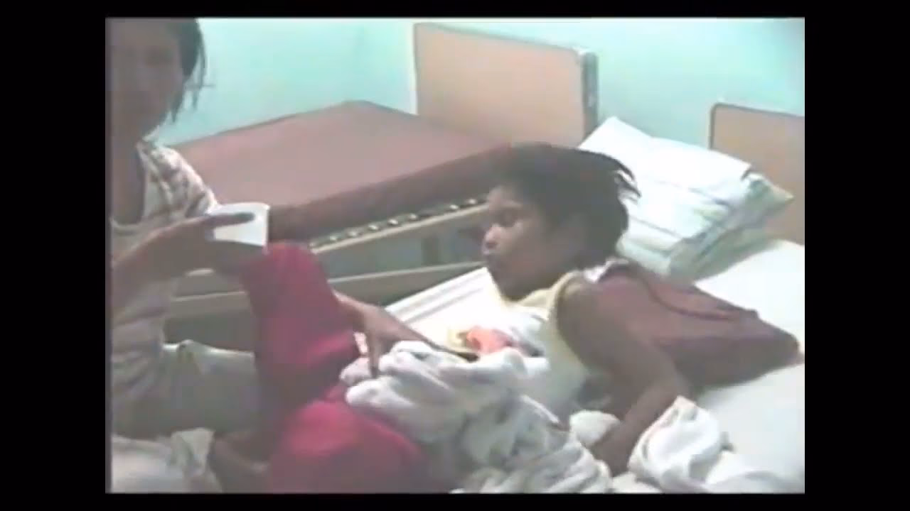 What are the symptoms of rabies?