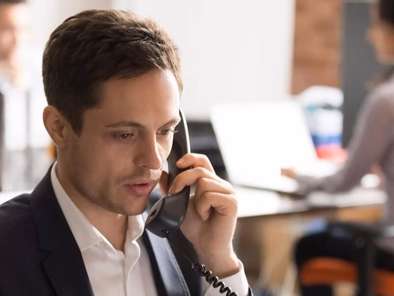 What should a receptionist say to a caller?