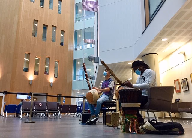 Who is music in hospitals & care?