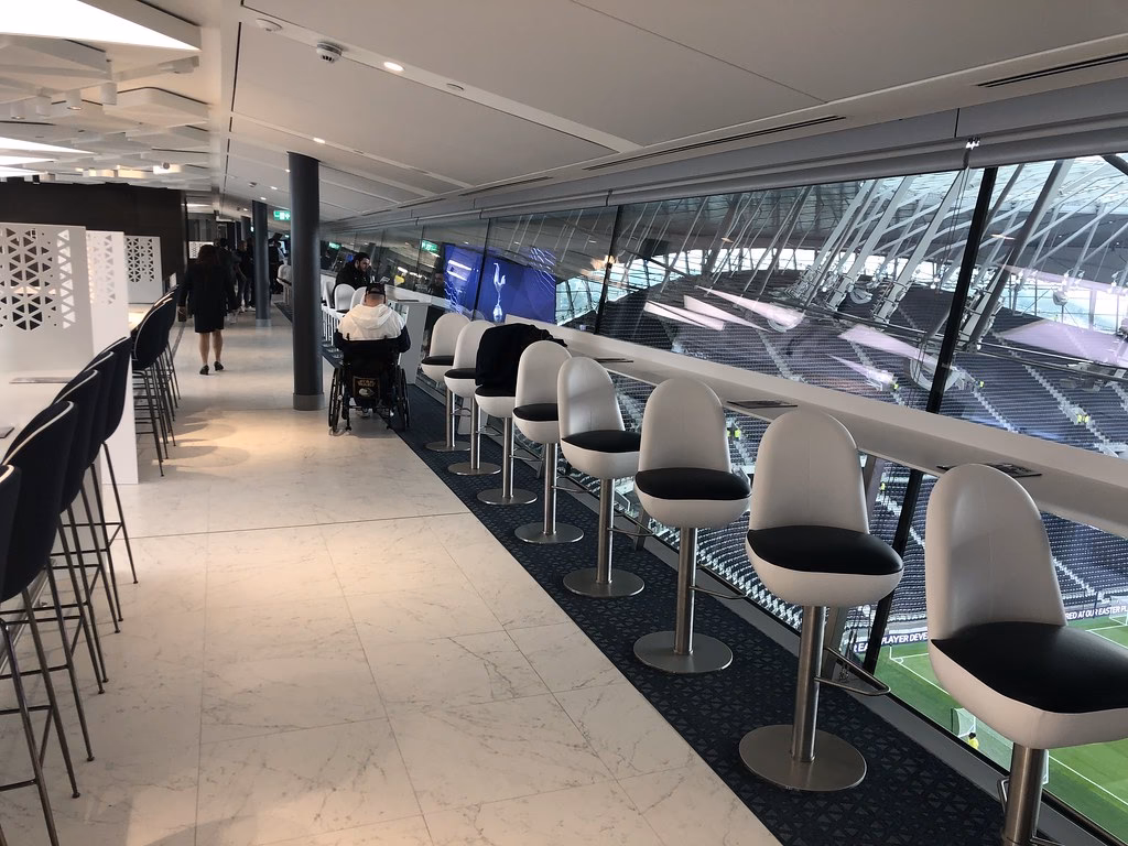 What hospitality packages are available at Tottenham Hotspur Stadium?