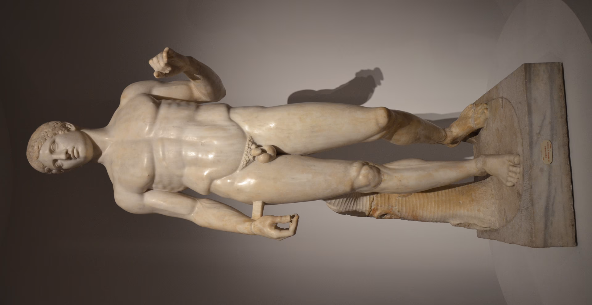 Why is the polychromy of classical sculpture suppressed in Western art?