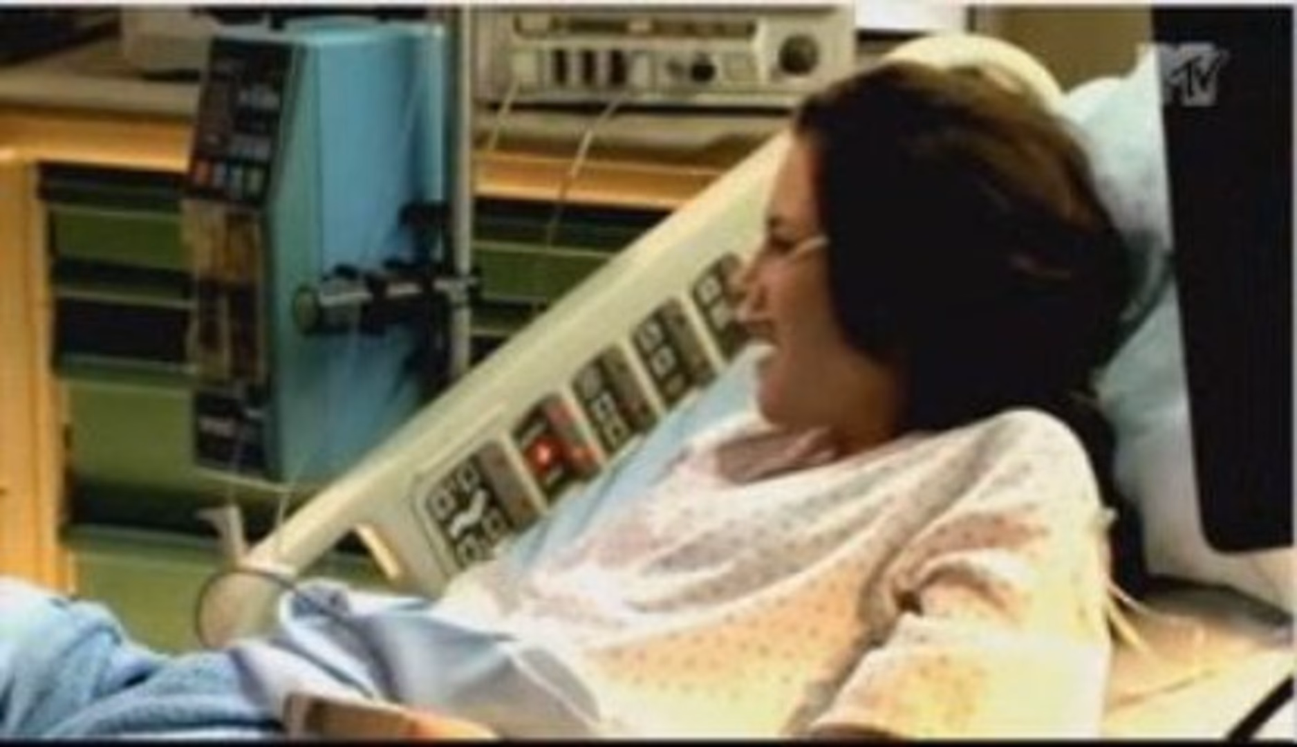 Why does Bella wake up in a hospital room?