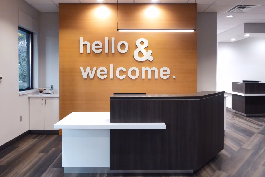 What does I Meet you in the front desk area mean?